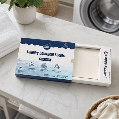 Happy Ripples Fresh Linen 100-load laundry detergent sheets box displayed in a clean laundry room