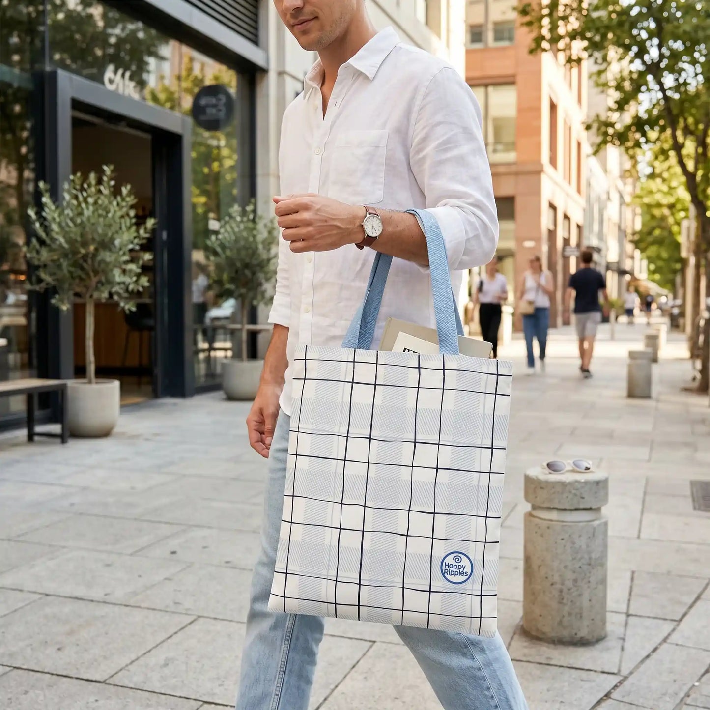 Happy Ripples plaid tote bag carried outdoors in an urban setting.
