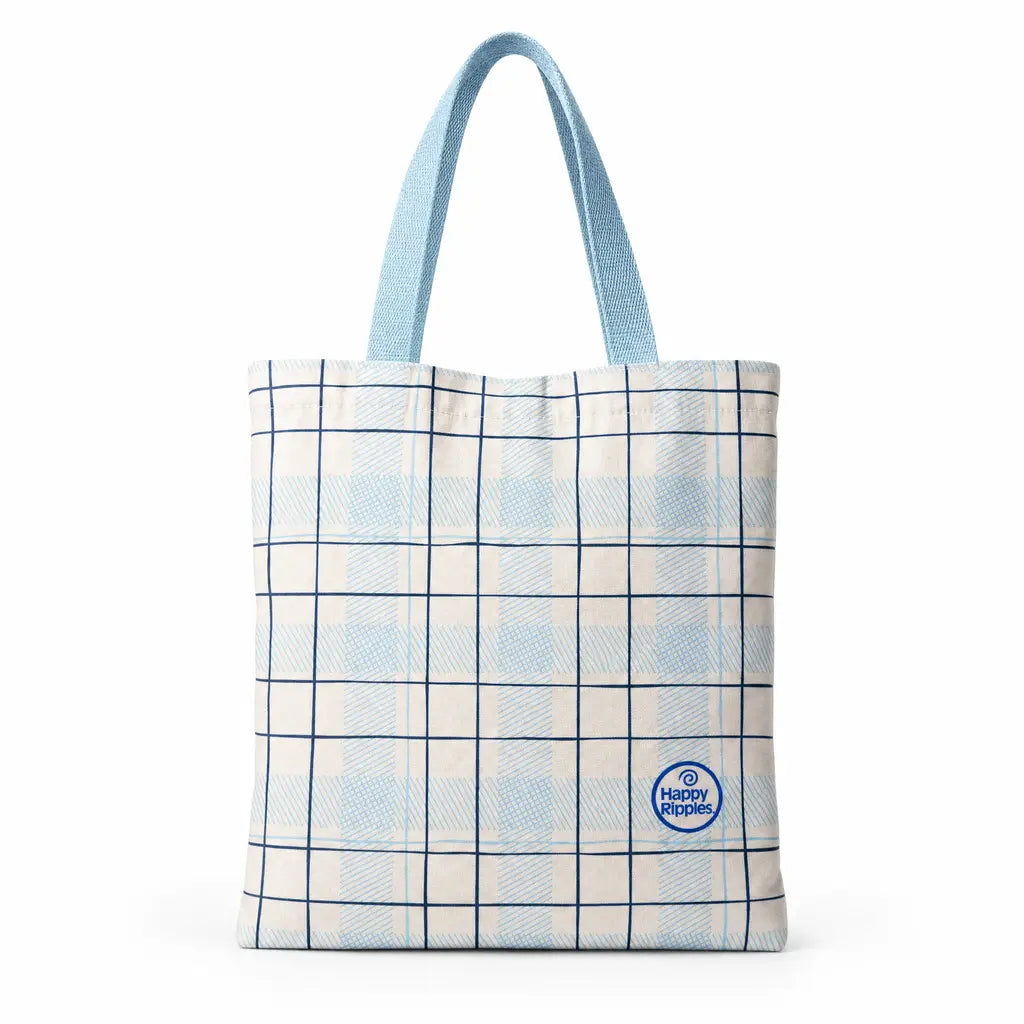 Happy Ripples blue plaid tote bag with light blue handles on white background.
